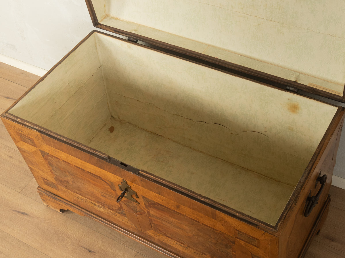 Baroque domed-top chest with inlay, pre-1900