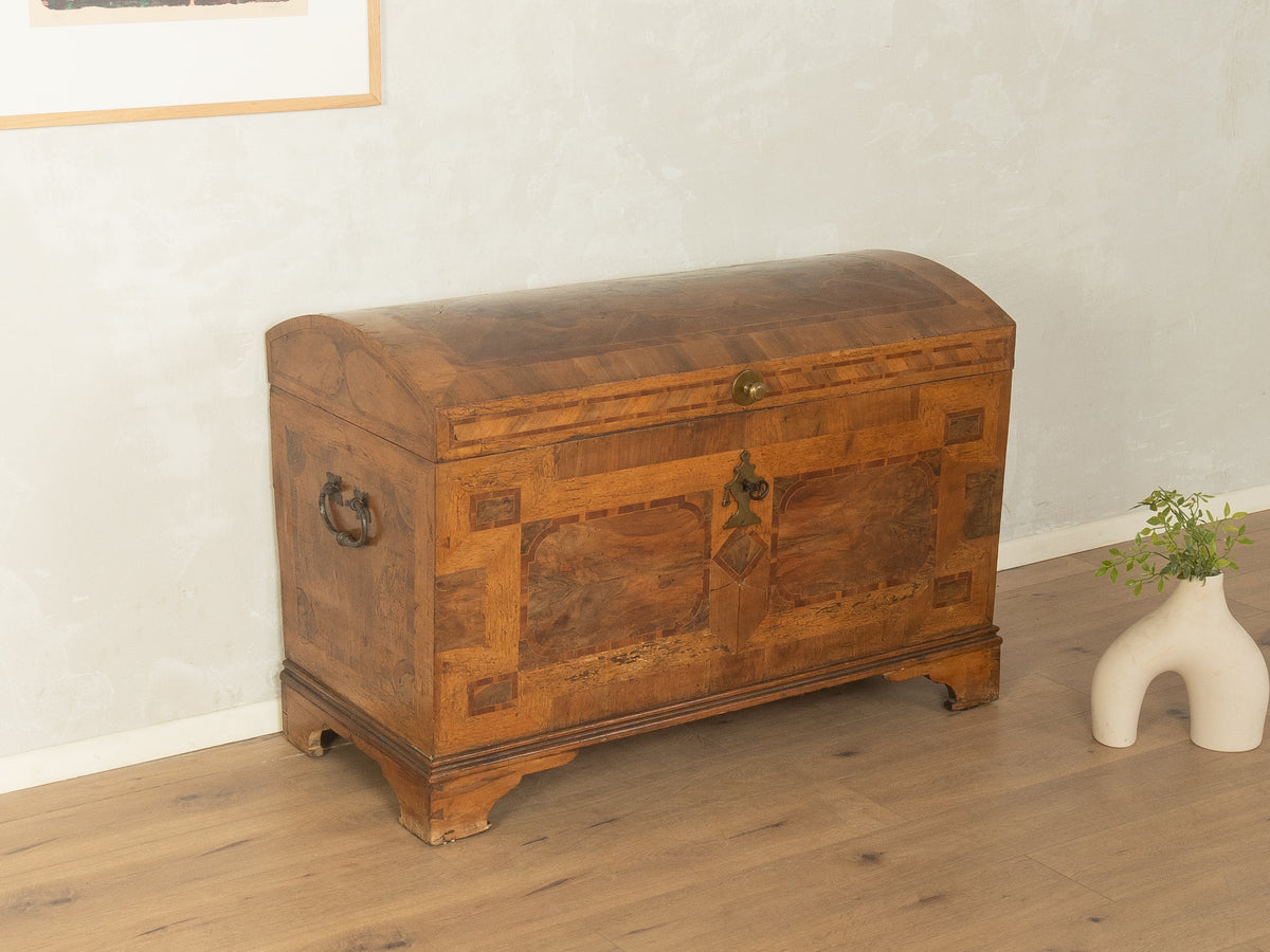 Baroque domed-top chest with inlay, pre-1900